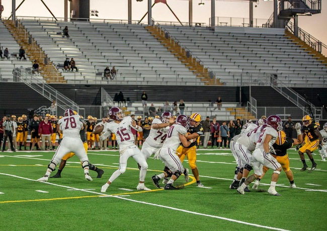 Alex Flores throwing one of his five touchdowns. (Photo Courtesy of DavesSportsImage)