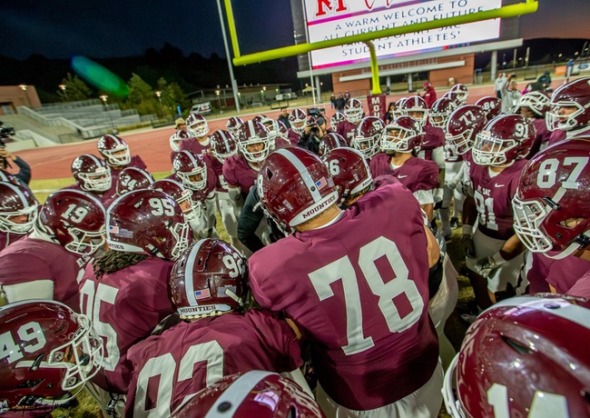 Mounties gather for a pre-game huddle, preparing to take on Golden West in a high-stakes matchup.