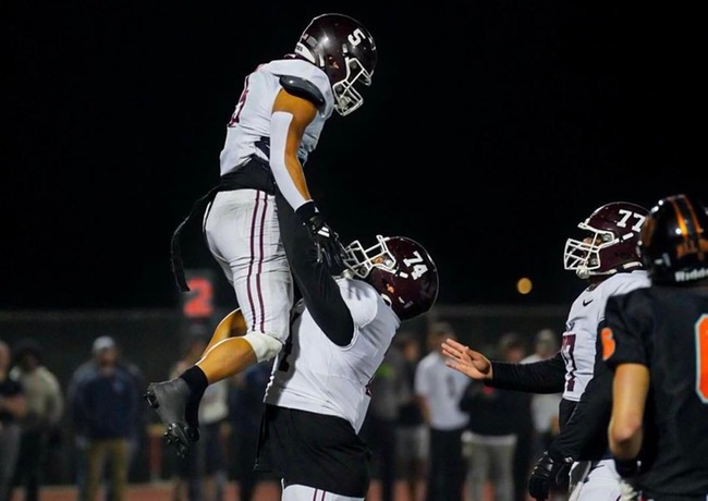 Running back Aiden Ramos celebrates in the end zone after capping off a key scoring drive for the Mounties.