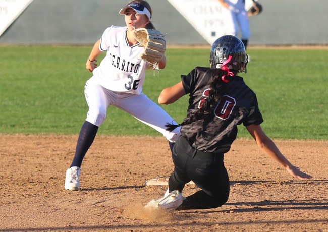 Caitlyn Felina attempting to steal 2nd base