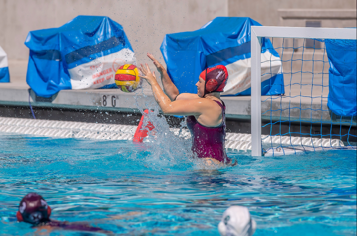 Bethany Dougherty defends the goal.